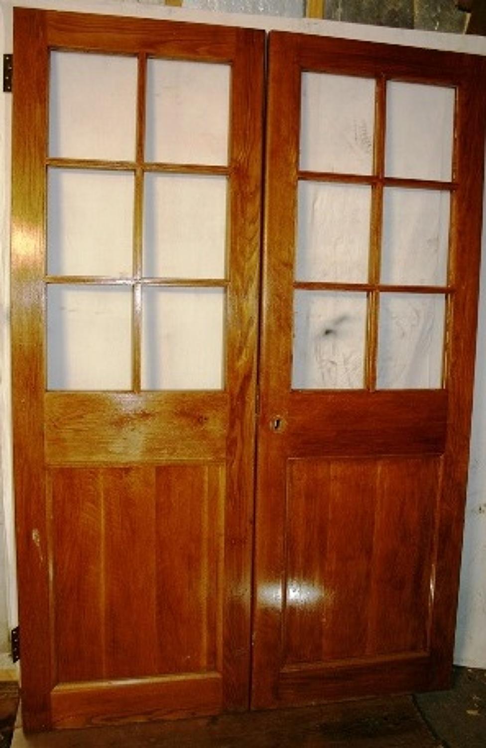 DP0224 A Pair of Edwardian Oak Doors for Glazing