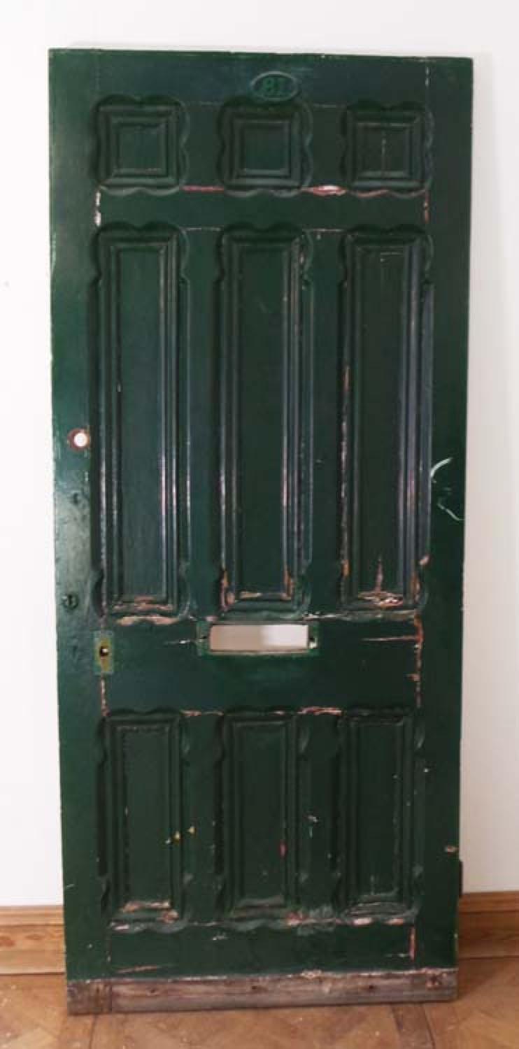DE0560 A SUBSTANTIAL VICTORIAN PINE PANELLED DOOR