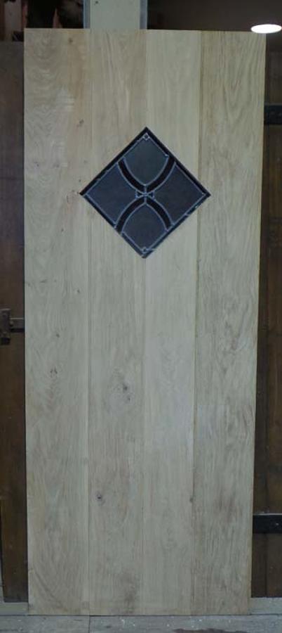 DI0575 STUNNING SOLID OAK LEDGED, PLANKED STAINED GLASS DOOR