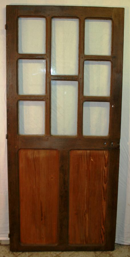 DI0644 A French Oak Door with Pine Panels And Perspex Glazing