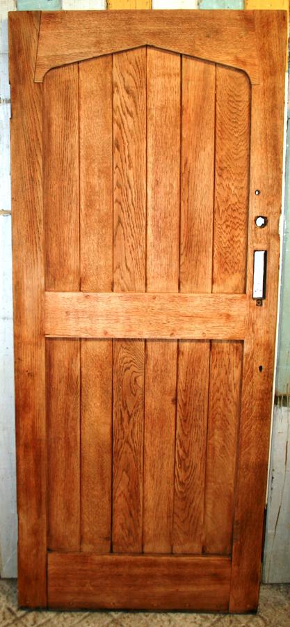 DE0746 An Oak Cottage Door with 6 Panels topped by an Arched Header