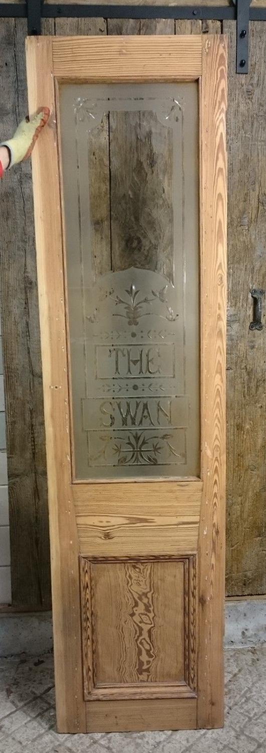 A decorative Victorian pitch pine etched glass panel 