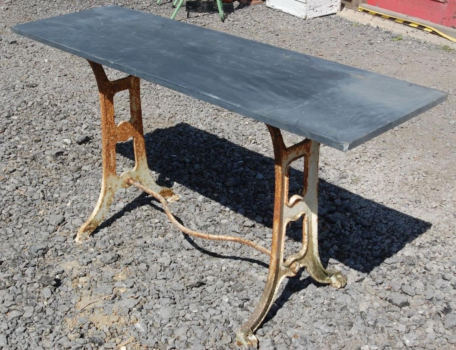 Slate topped garden table on cast iron singer sewing machine base