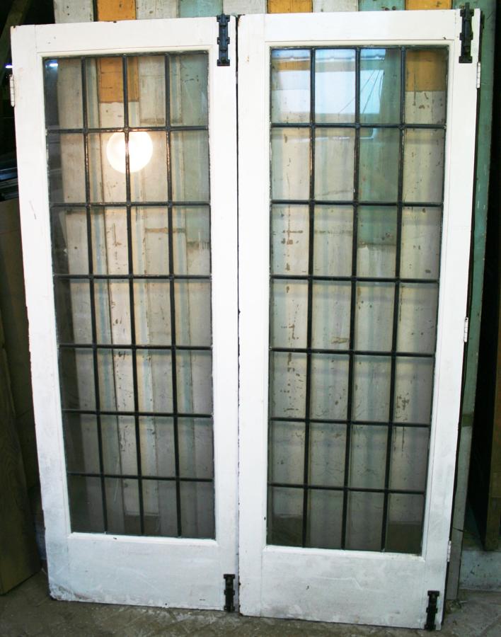 DP0252 A Pair of Matching Edwardian Pine Doors with Leaded Panels