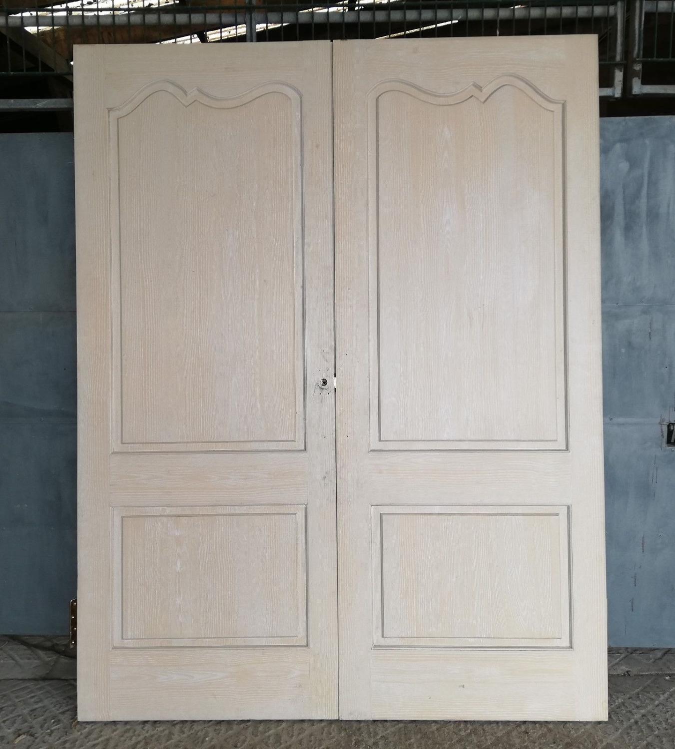 DP0246 A PAIR OF RECLAIMED FRENCH CHATEAU STYLE INTERNAL PINE DOORS