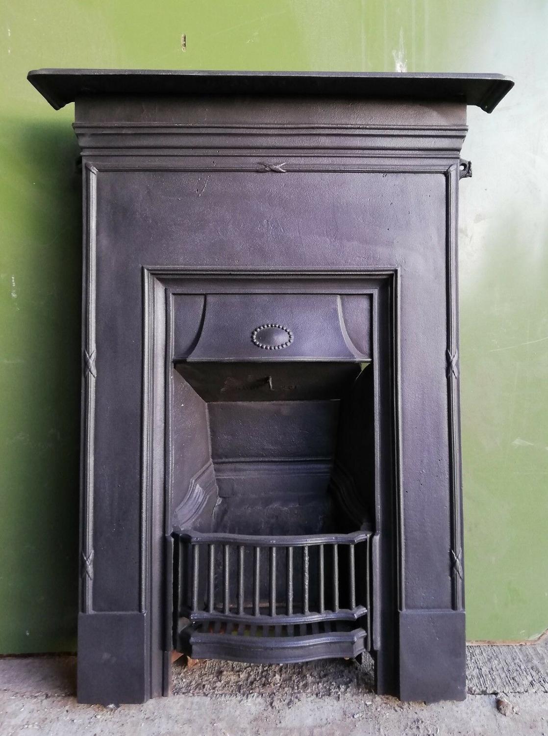 FC0041 A SMALL EDWARDIAN CAST IRON COMBINATION BEDROOM FIRE