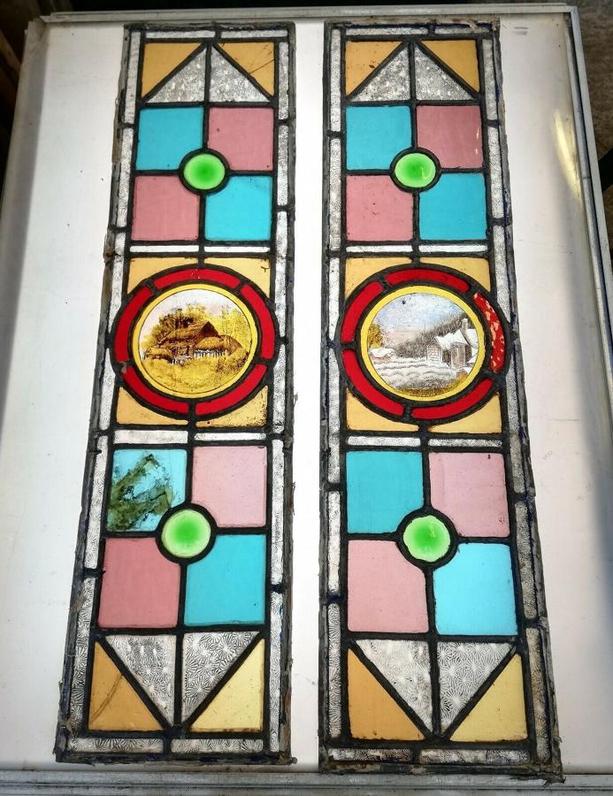 M1258 A PAIR OF ANTIQUE STAINED GLASS PANELS WITH HAND PAINTING