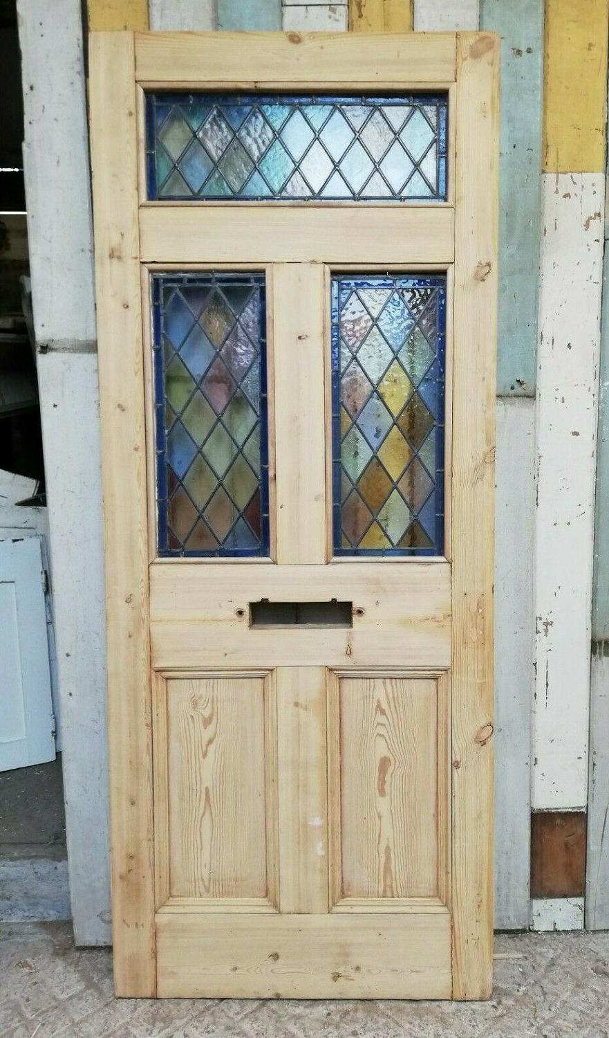 DE0797 A PRETTY RECLAIMED FIVE PANEL PINE AND STAINED GLASS DOOR