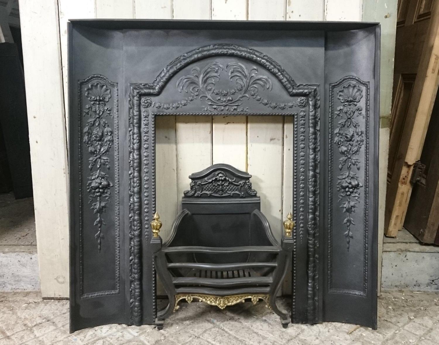1077 EDWARDIAN CAST IRON FIRE FRONT WITH CURVED FIRE CHEEKS