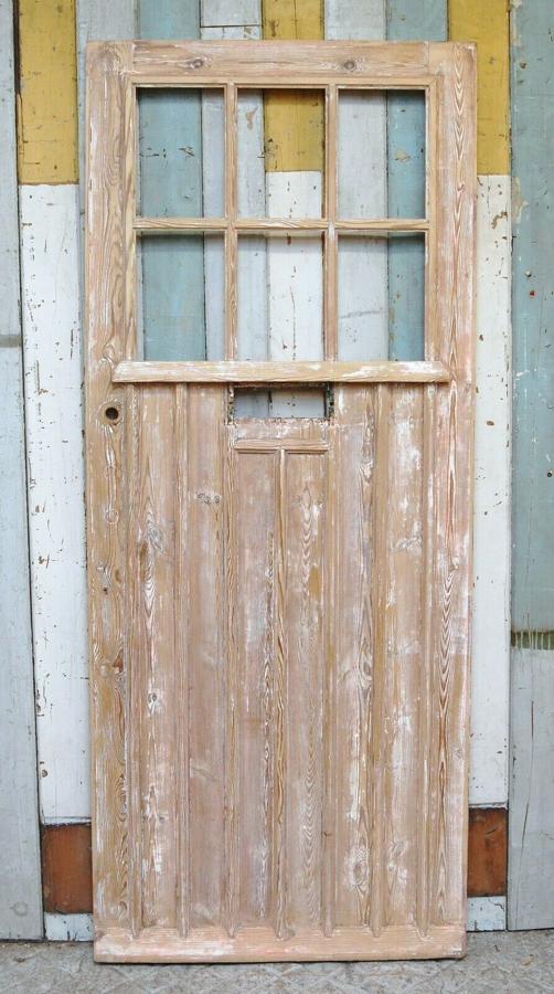 DE0810 A RECLAIMED PINE COTTAGE FRONT DOOR WITH PANELS FOR GLAZING