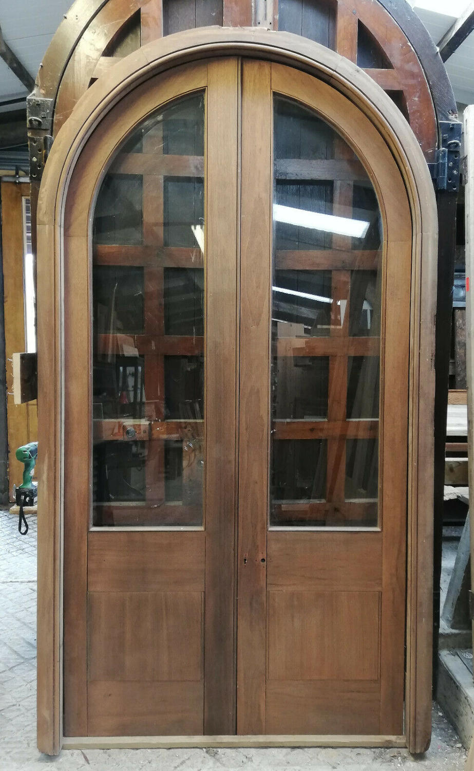 DP0275 PAIR OF SUBSTANTIAL ARCHED GLAZED MAHOGANY DOORS AND FRAME