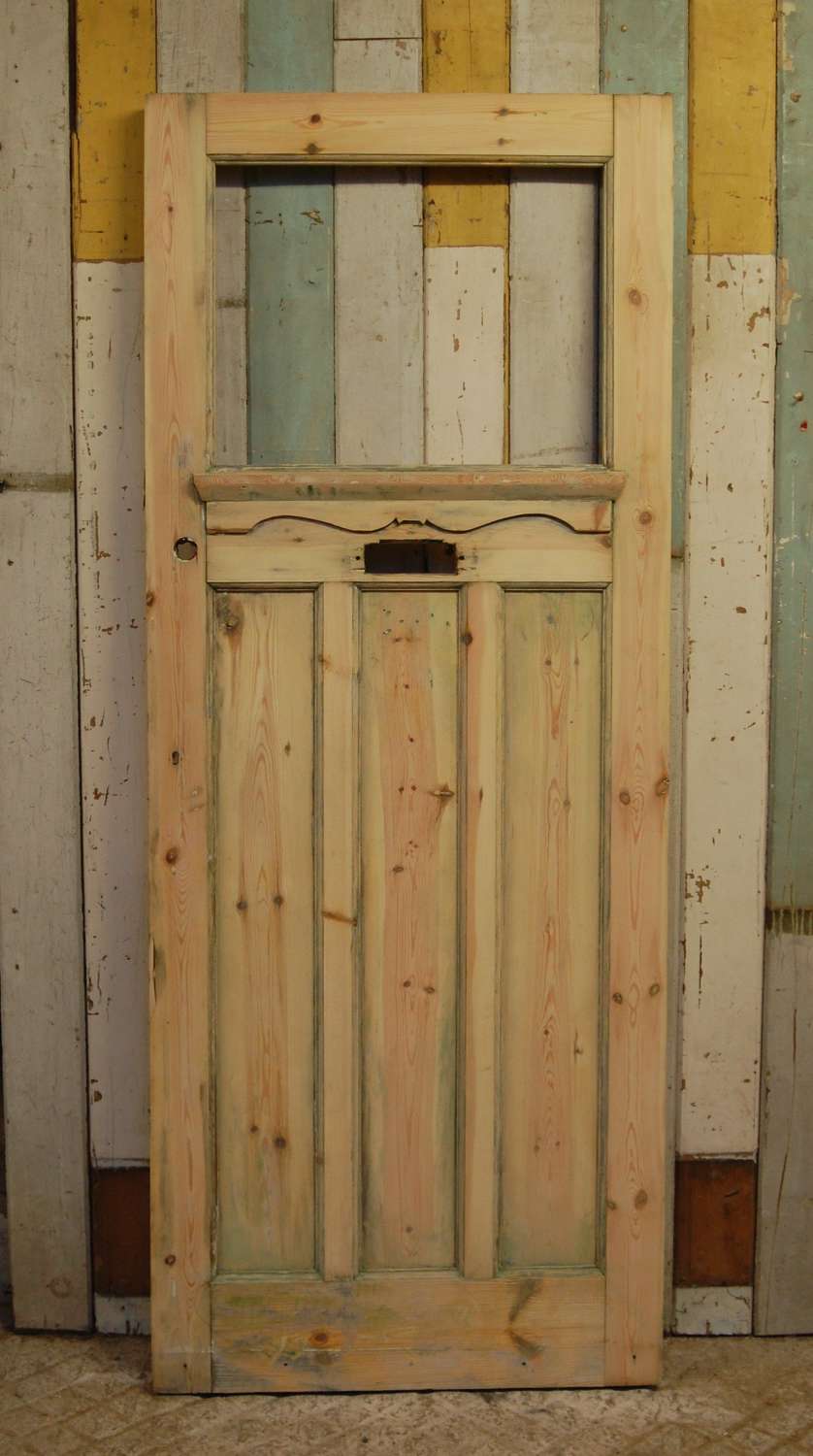 DE0586 EDWARDIAN STRIPPED PINE FRONT DOOR WITH PANEL FOR GLAZING