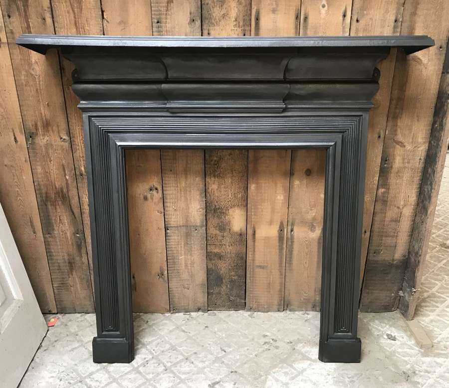 FS0110 A RECLAIMED EDWARDIAN CAST IRON FIRE SURROUND FOR WOODBURNER