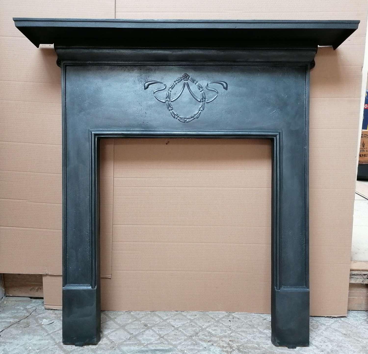 FS0119 A RECLAIMED EDWARDIAN CAST IRON FIRE SURROUND FOR WOODBURNER