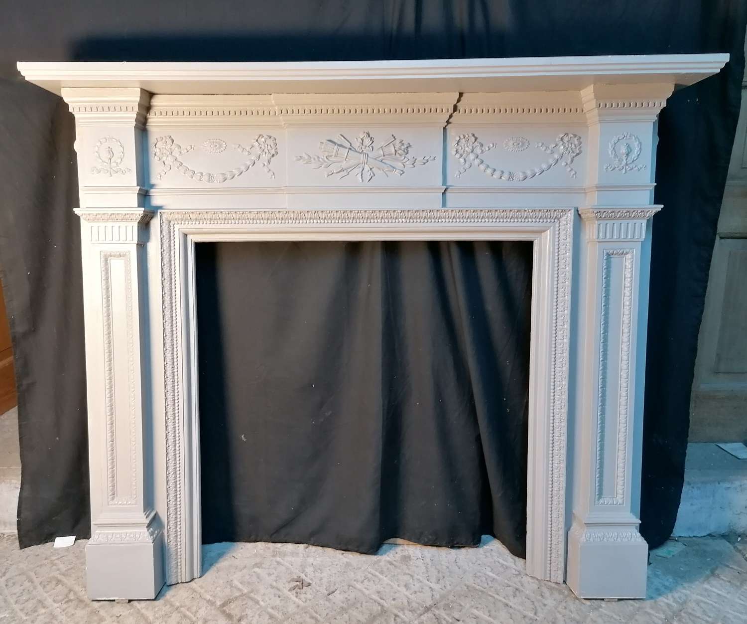 FS0135 A VERY LARGE RECLAIMED ANTIQUE PAINTED CAST IRON FIRE SURROUND