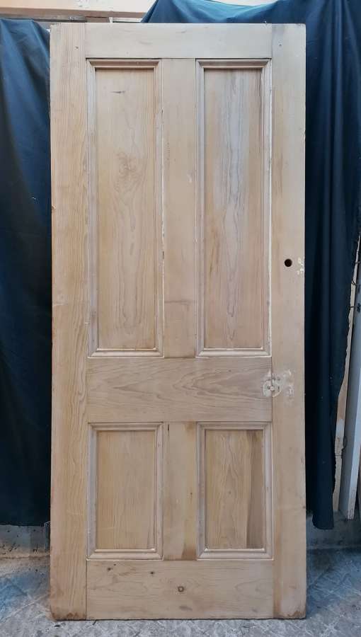 DI0730 A LARGE RECLAIMED STRIPPED PINE 4 PANEL INTERNAL DOOR