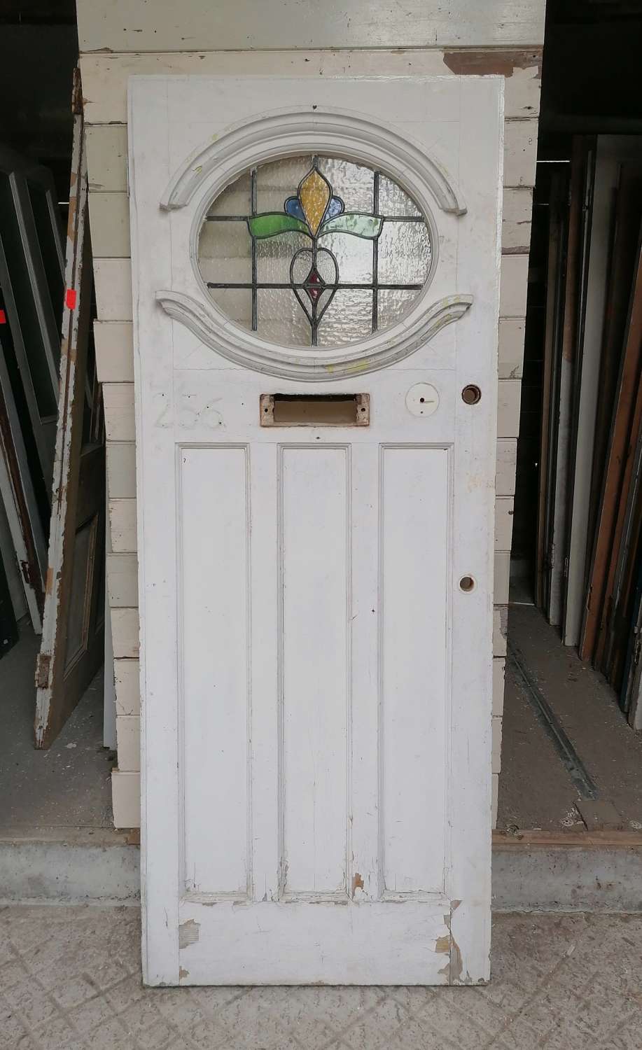 DE0892 A RECLAIMED EDWARIDAN PINE FRONT DOOR WITH STAINED GLASS