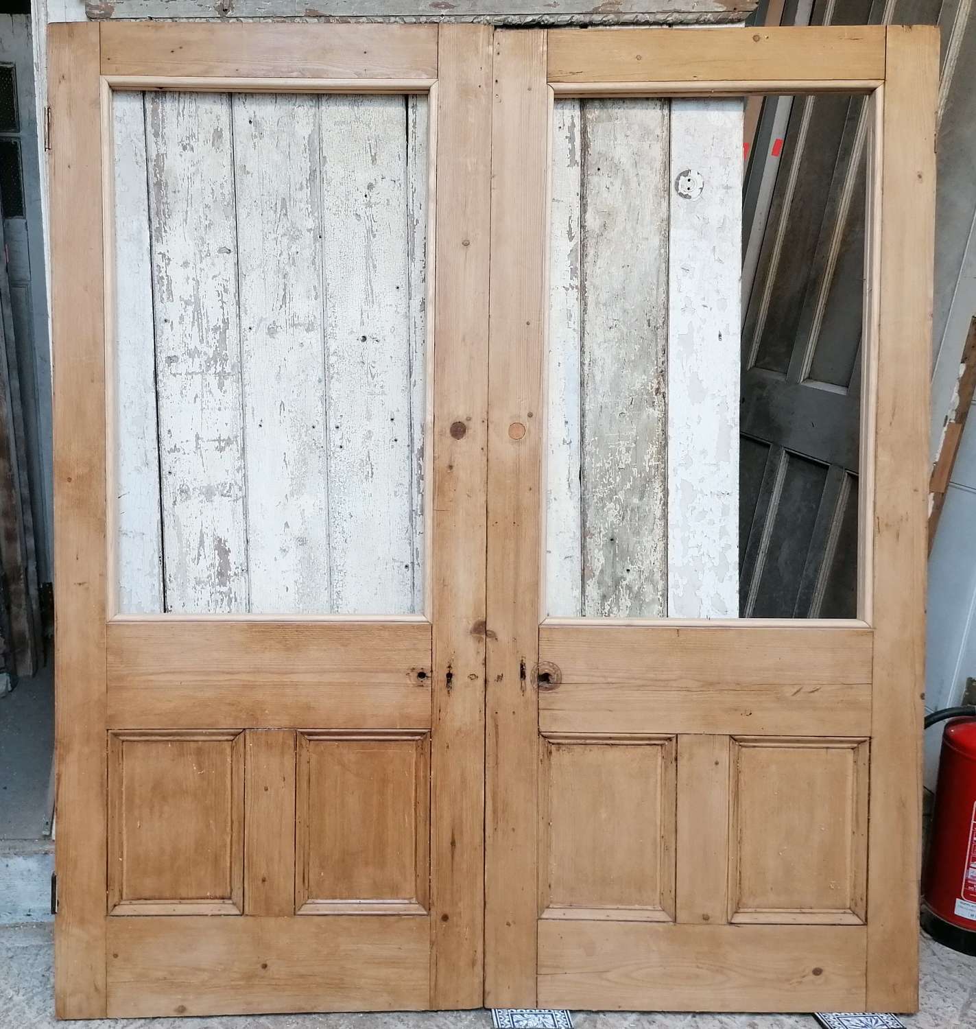 DP0323 A PAIR OF RECLAIMED VICTORIAN INTERNAL PINE DOORS FOR GLAZING