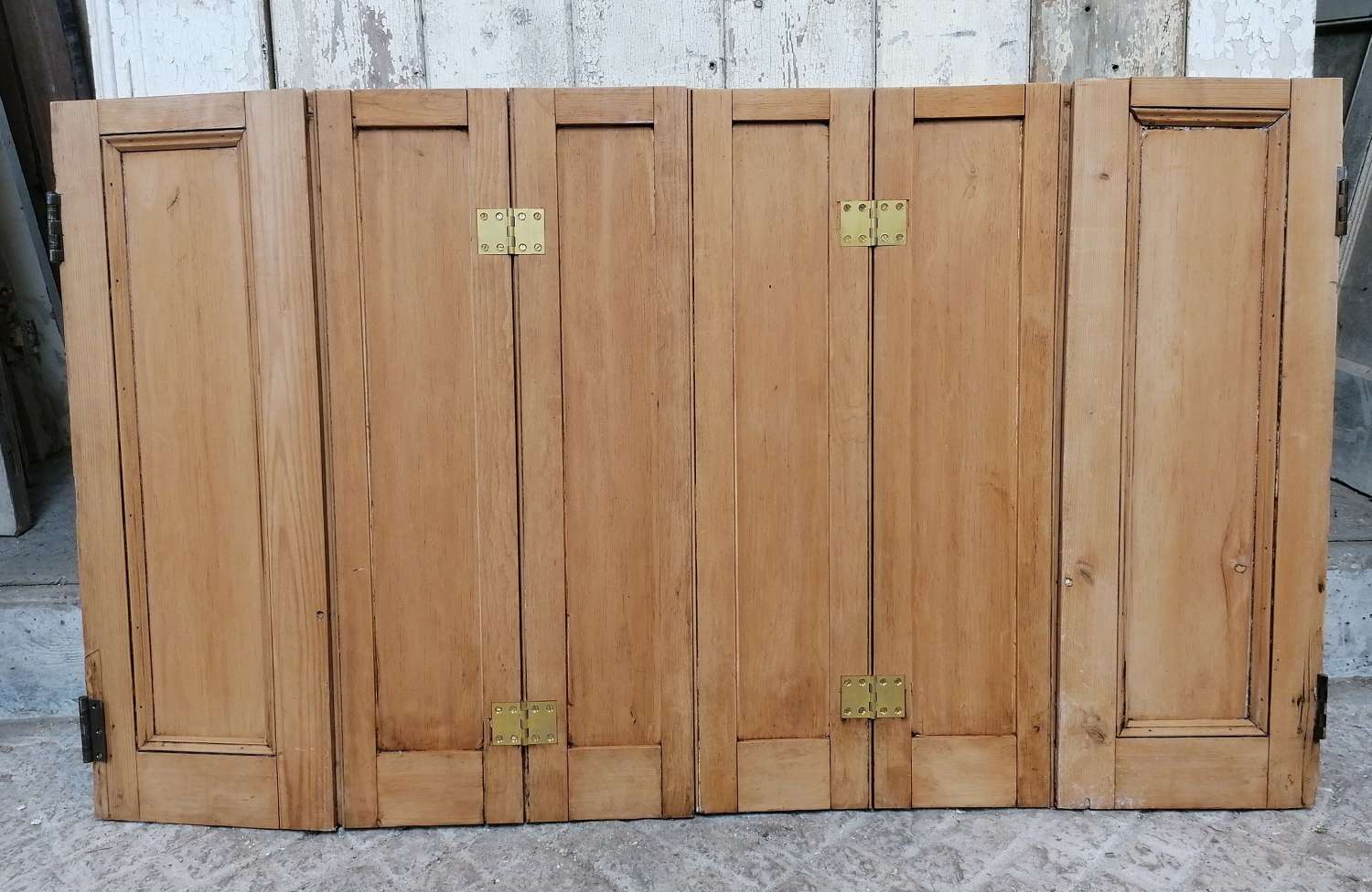 CS0053 A PAIR OF RECLAIMED STRIPPED PINE WAXED WINDOW SHUTTERS