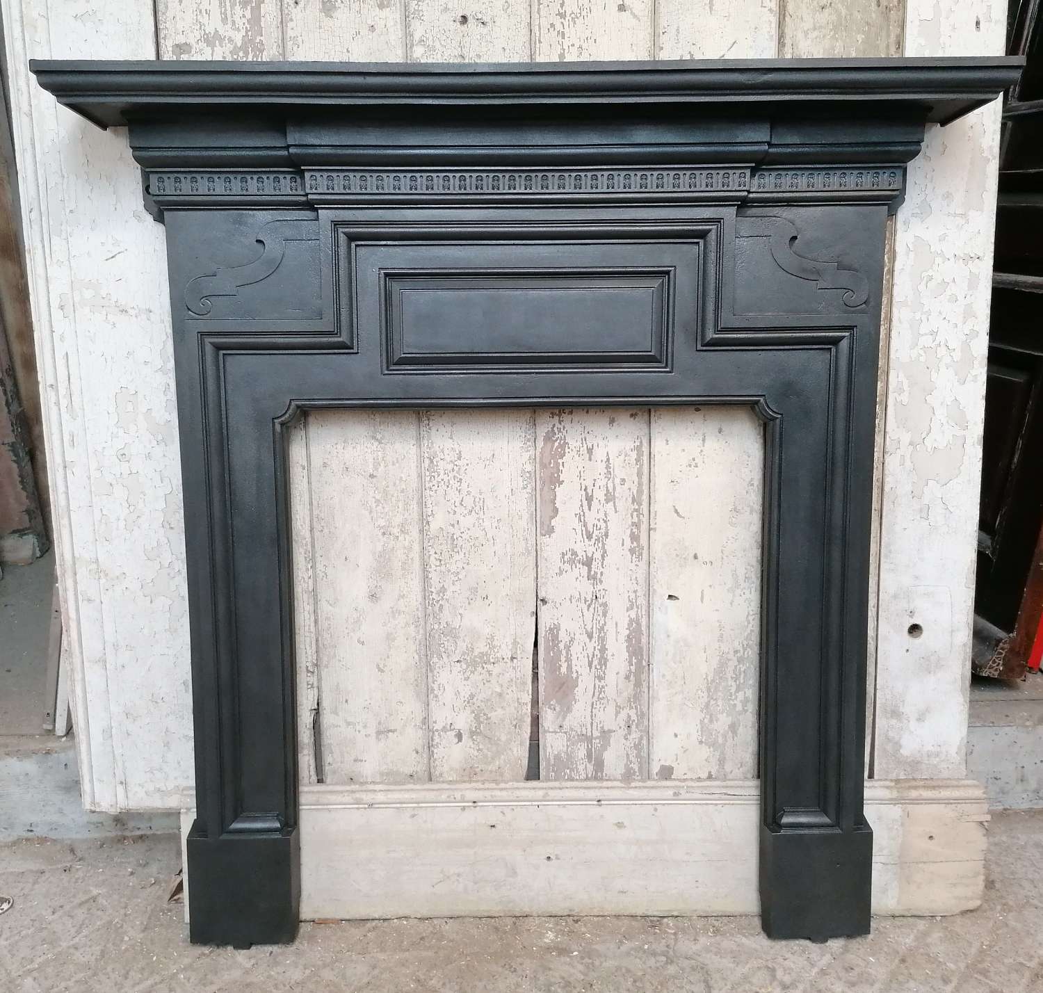 FS0155 A GEORGIAN STYLE CAST IRON FIRE SURROUND FOR WOOD BURNER C.1900