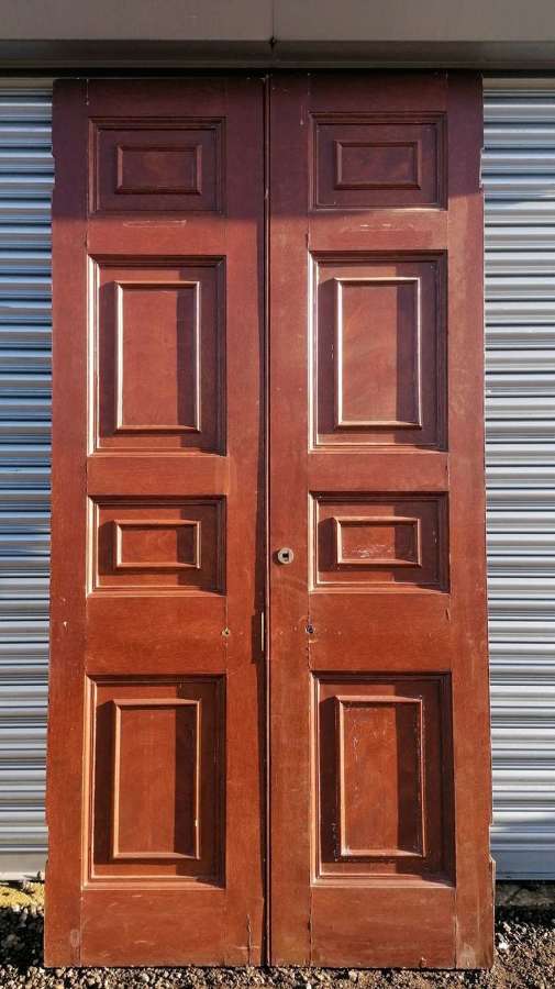 DP0354 A PAIR OF TALL RECLAIMED LATE GEORGIAN PINE INTERNAL DOORS