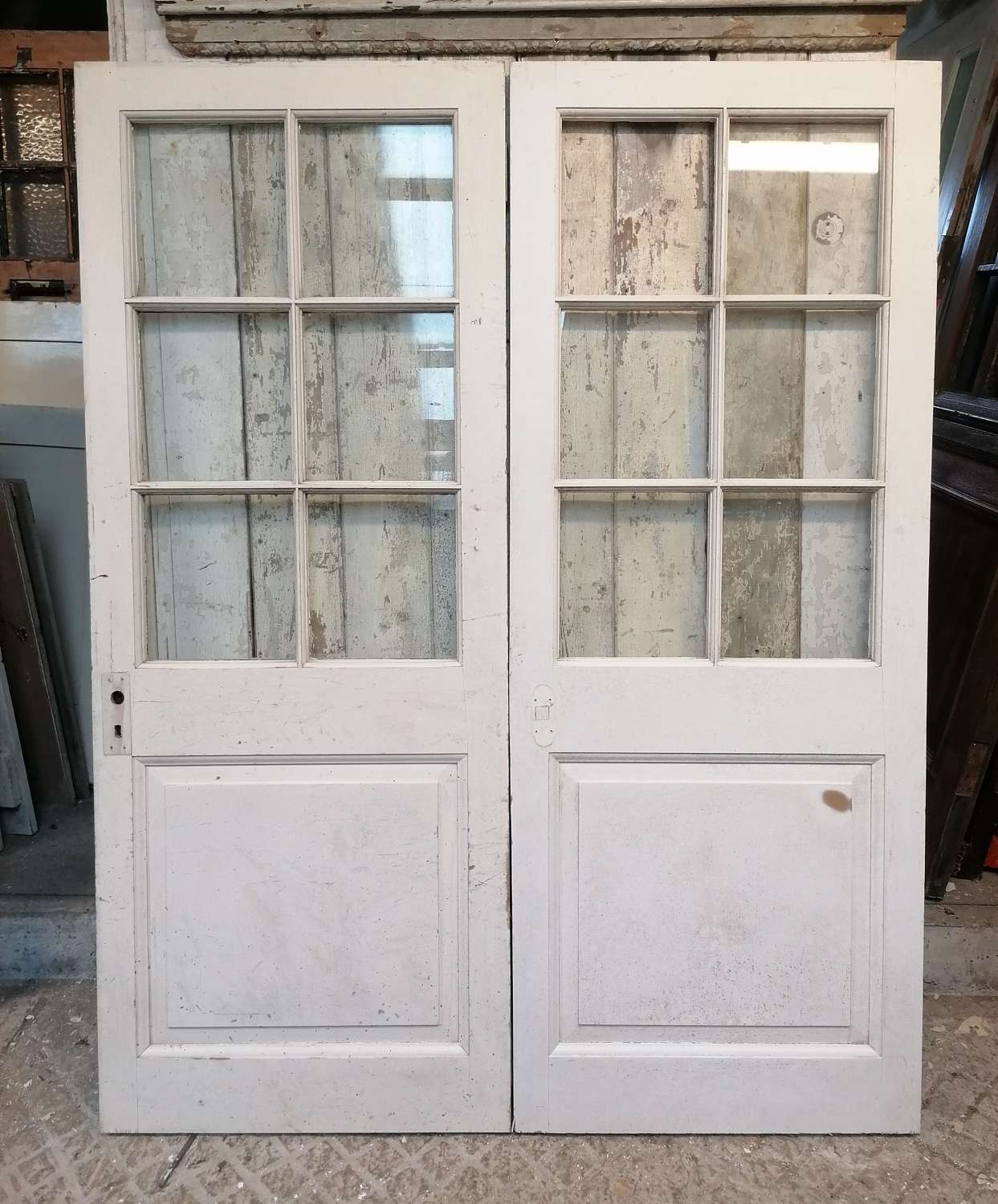 DP0357 TWO RECLAIMED INTERNAL PAINTED PINE DOORS FOR GLAZING