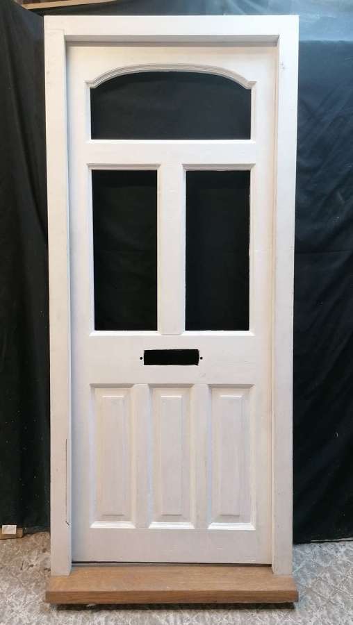 DE0935 RECLAIMED VICTORIAN PRIMED PINE FRONT DOOR WITH NEW FRAME