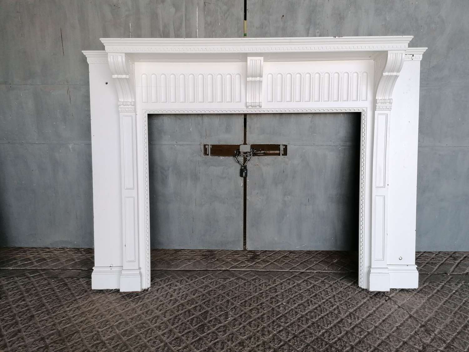 FS0199 A VERY LARGE RECLAIMED PAINTED OAK FIRE SURROUND EARLY 20th C.