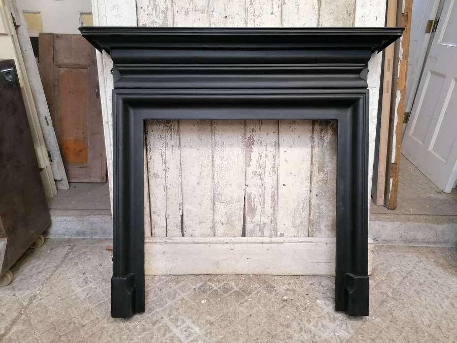 FS0200 A LARGE RECLAIMED REPRODUCTION CAST IRON FIRE SURROUND