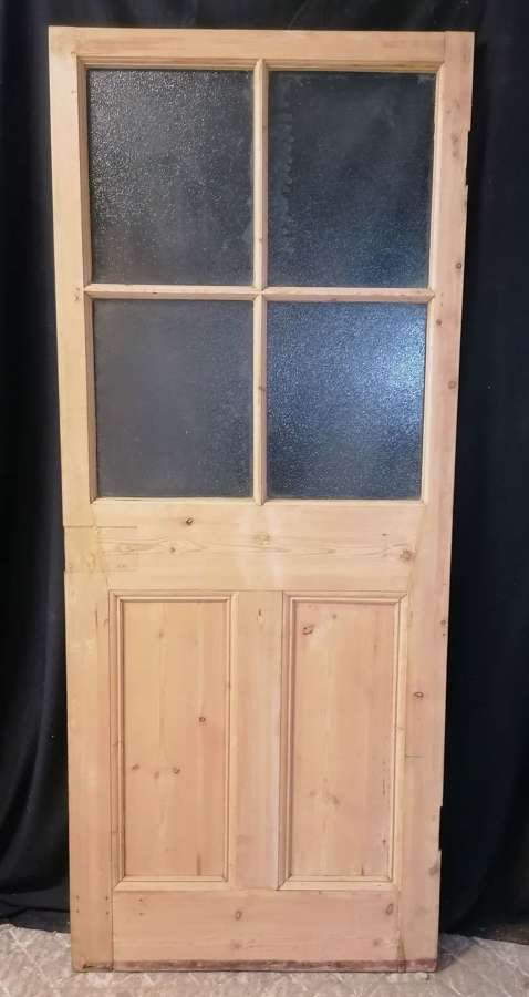 DI0781 A RECLAIMED STRIPPED PINE ANTIQUE INTERNAL DOOR WITH GLASS