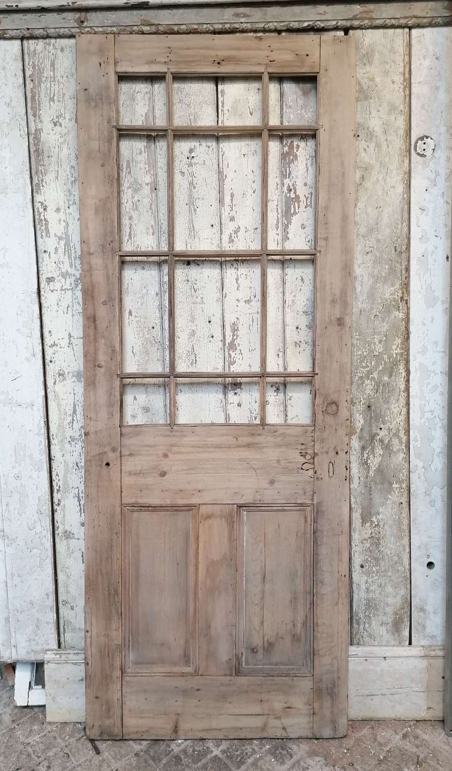 DI0793 A RECLAIMED ANTIQUE STRIPPED PINE INTERNAL CARDIFF DOOR