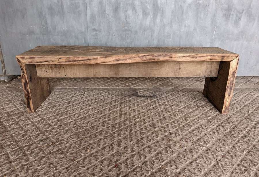 M1700 A RUSTIC RECLAIMED 2 SEATER CONTINUOUS GRAIN OAK BENCH