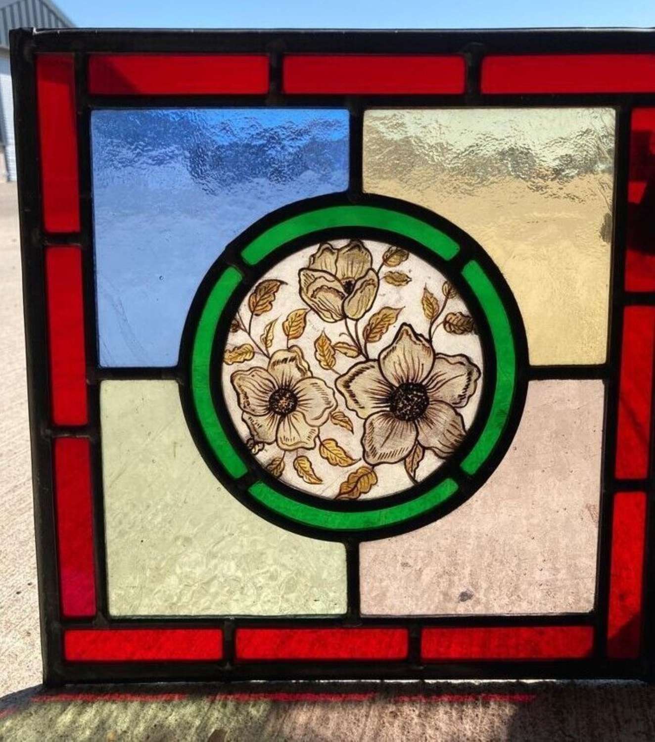 M1722 A RECLAIMED HARLEQUIN STAINED GLASS PANEL HAND PAINTED FLOWER