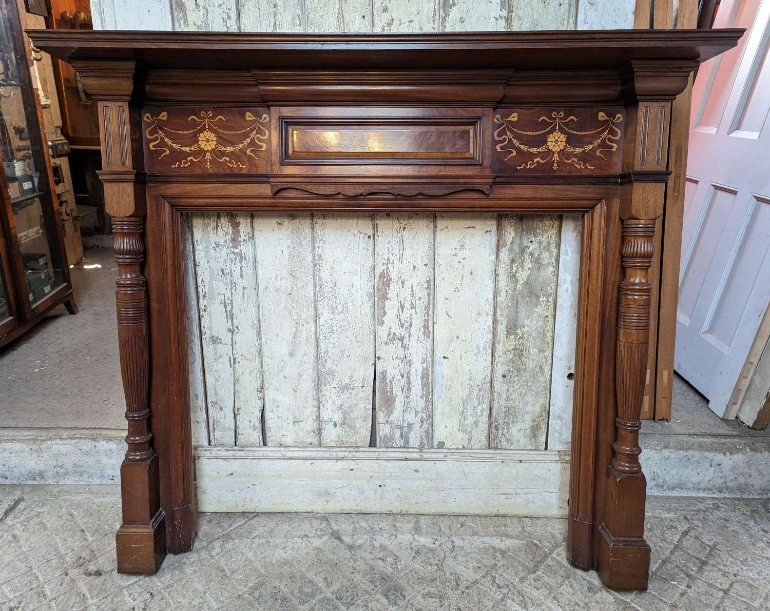 FS0234 A LARGE RECLAIMED INLAYED / MARQUETRY MAHOGANY FIRE SURROUND
