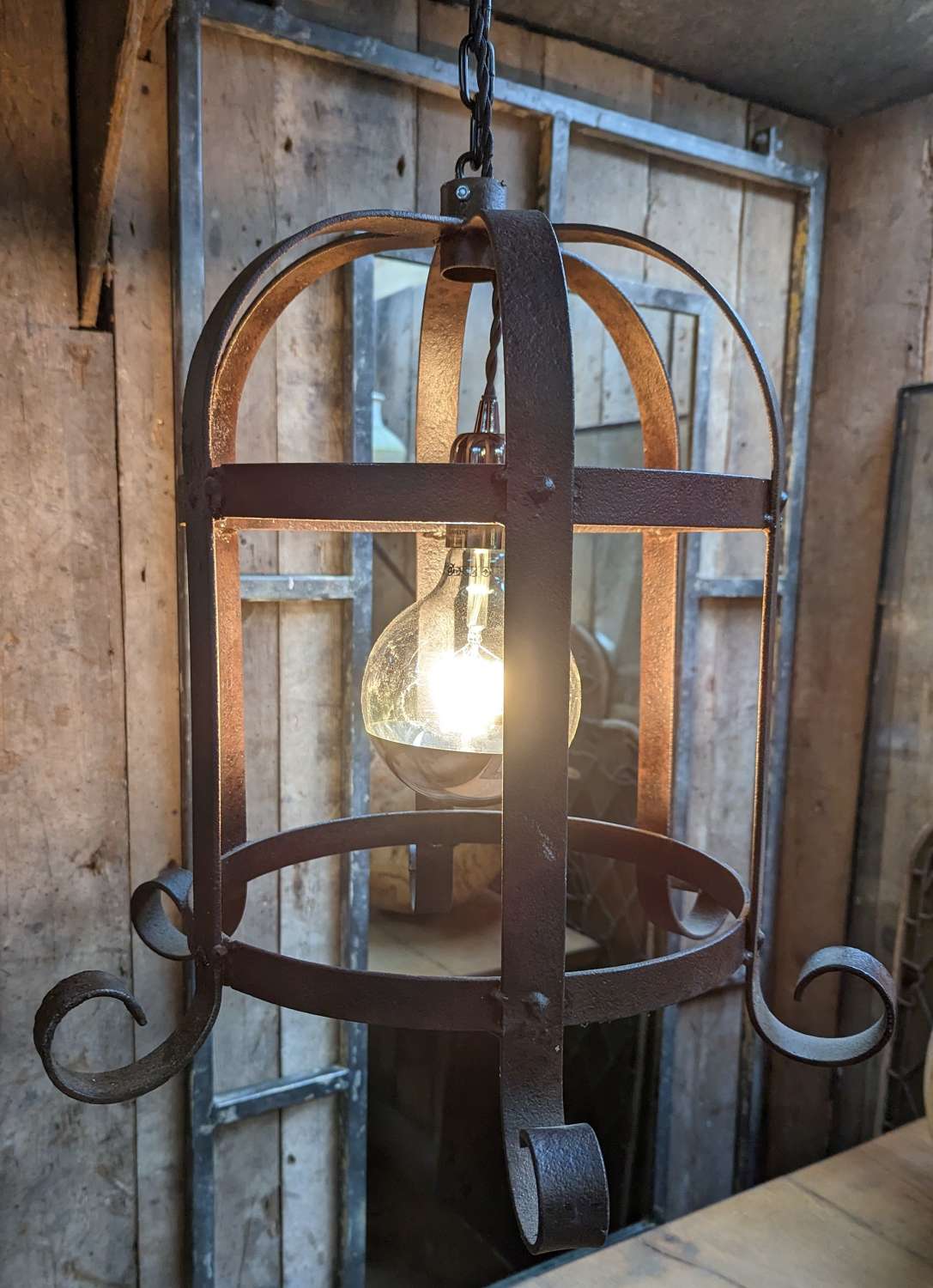 M1807 AN INDUSTRIAL STYLE HANGING LIGHT UPCYCLED FROM AN IRON BRAZIER