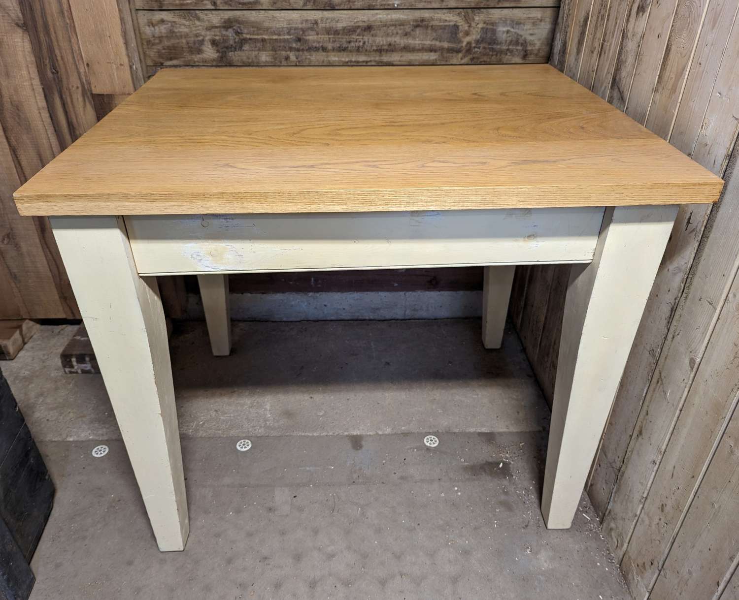 M1810 A RECLAIMED OAK TOPPED WOODEN TABLE 2 SEATER