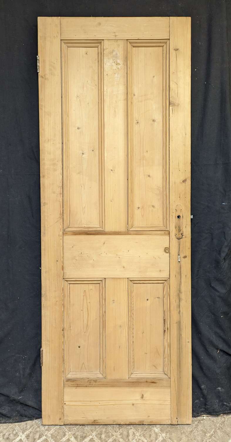 DI0841 A RECLAIMED 4 PANEL STRIPPED PINE INTERNAL DOOR