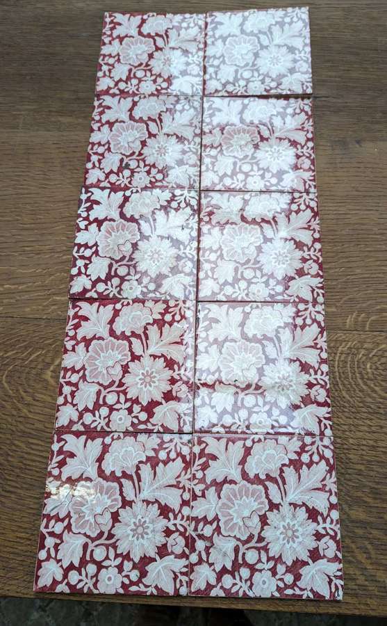 M1841 A SET OF 10 RECLAIMED ANTIQUE RED AND PINK FLOWER FIRE TILES