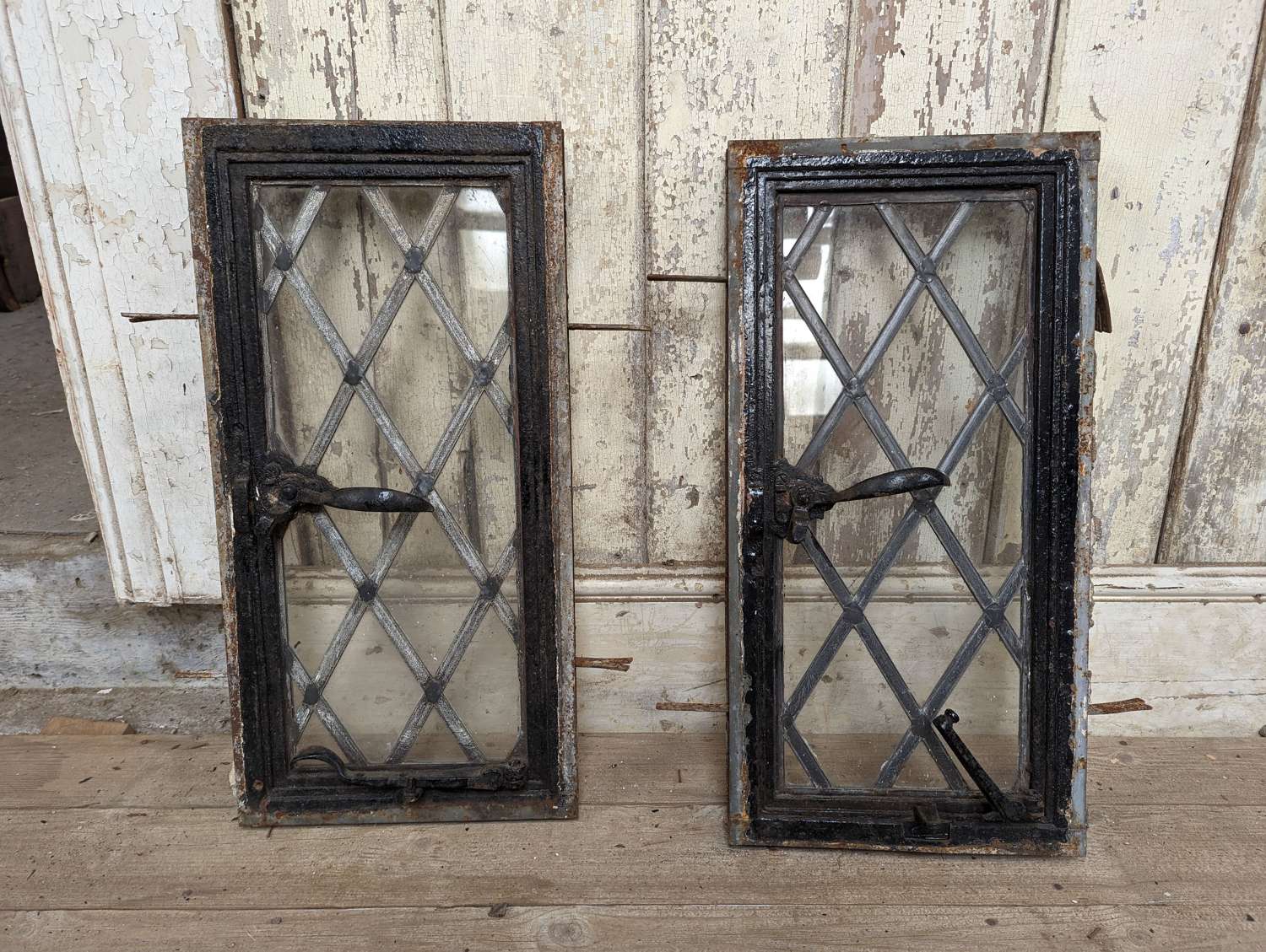 M1843 A PAIR OF RECLAIMED METAL ANTIQUE OPENING WINDOWS