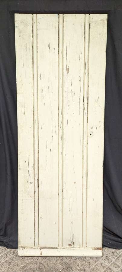 DB0750 A RECLAIMED PAINTED PINE DOOR WITH PLANKED EXTERNAL FACE
