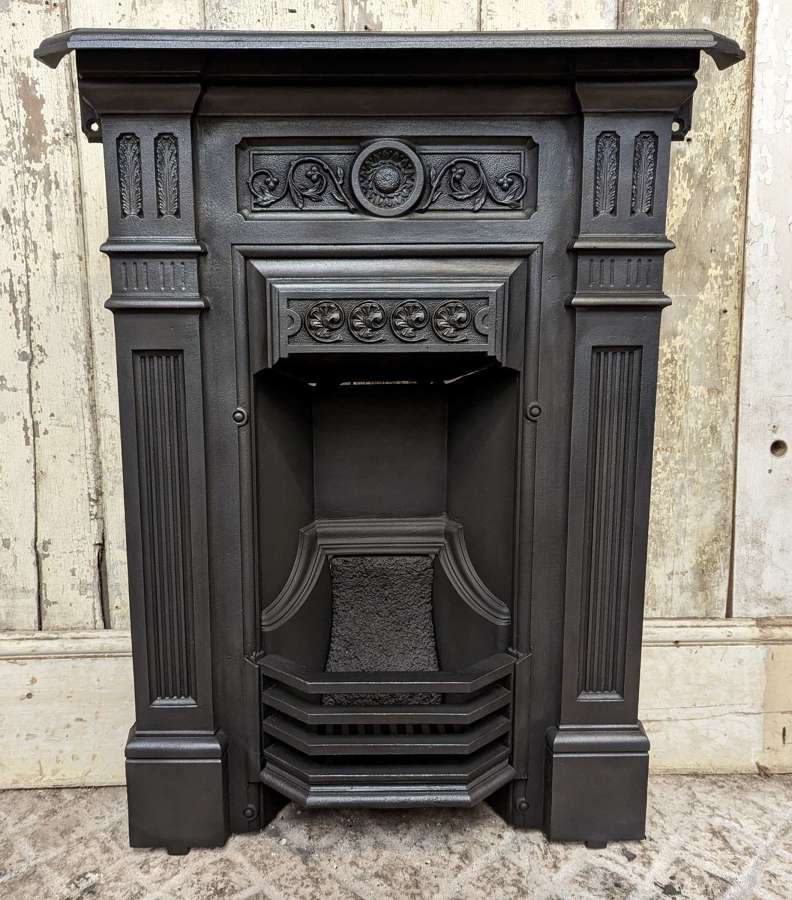 FC0186 A RECLAIMED LATE VICTORIAN CAST IRON BEDROOM COMBINATION FIRE