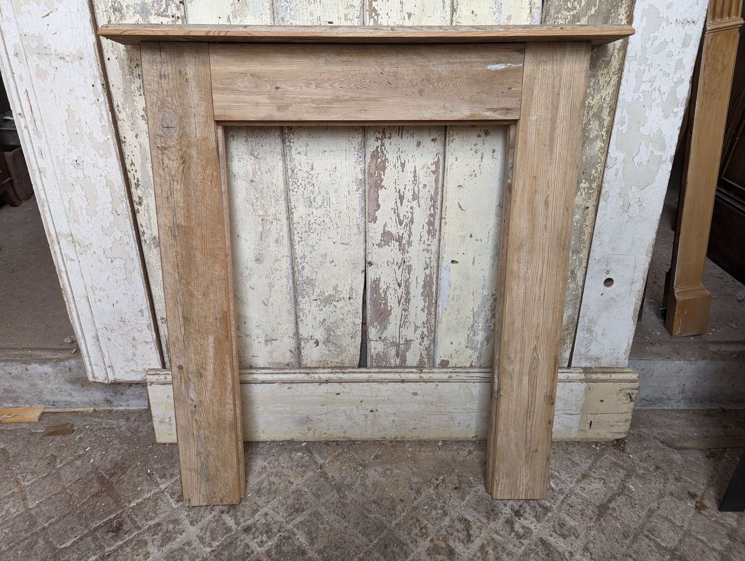 FS0265 A SMALL RECLAIMED STRIPPED PINE FIRE SURROUND