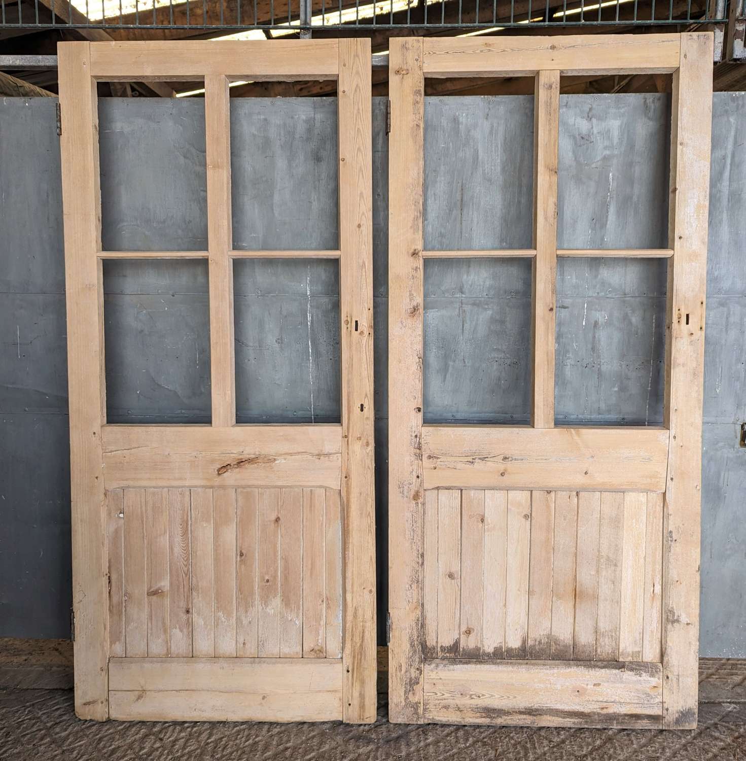 DP0467 TWO RECLAIMED INTERNAL STRIPPED PINE DOORS FOR USE AS PAIR