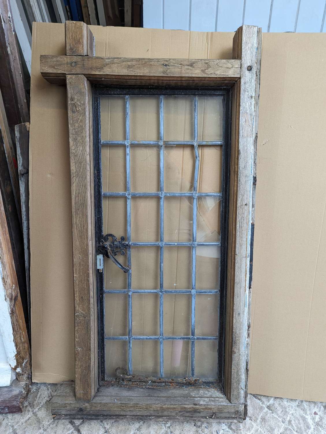 M1897 A LARGE RECLAIMED OPENING CRITTALL WINDOW IN OAK FRAME