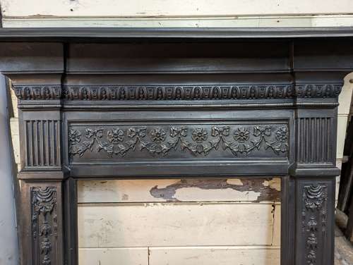 FS0299 A VERY PRETTY RECLAIMED EDWARDIAN CAST IRON FIRE SURROUND