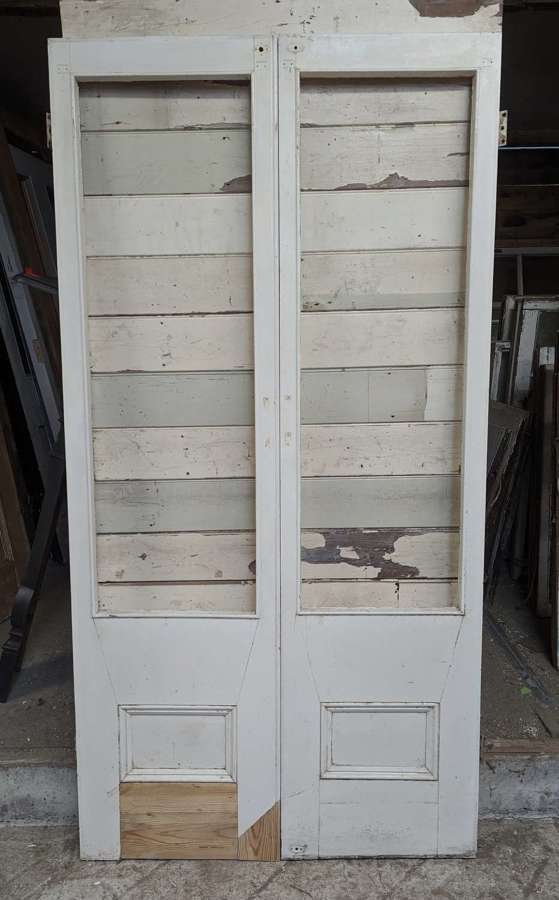 DP0492 A PAIR OF RECLAIMED PAINTED PINE INTERNAL FRENCH DOORS