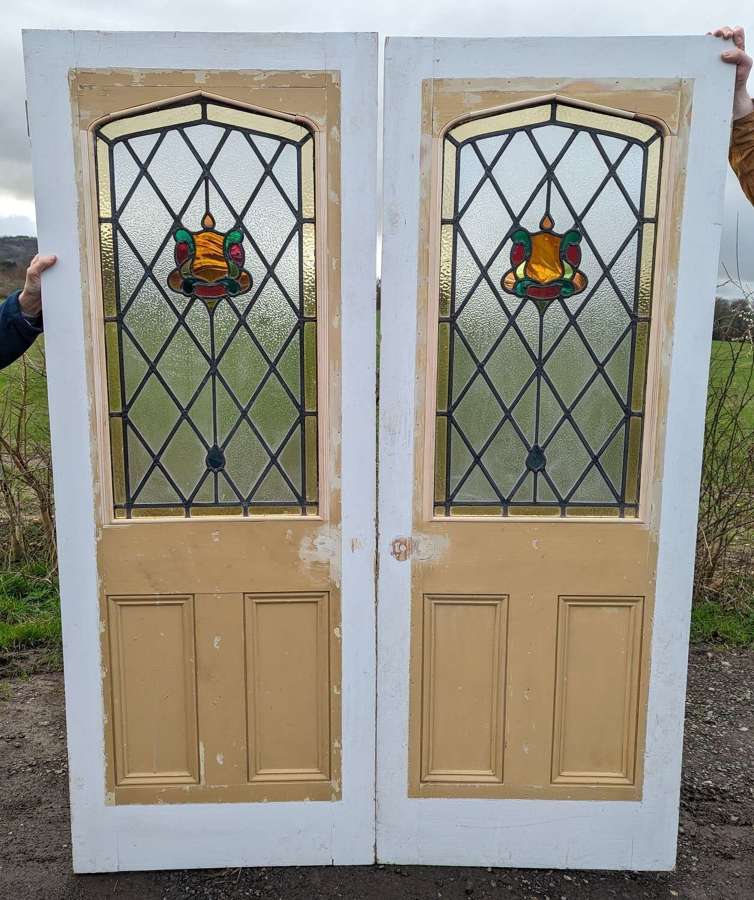 DP0499 PAIR OF RECLAIMED GOTHIC STAINED GLASS INTERNAL PINE DOORS