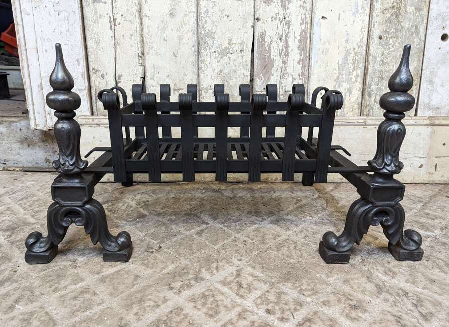 FB0139 A RECLAIMED DECORATIVE CAST IRON FIRE BASKET AND FIRE DOGS