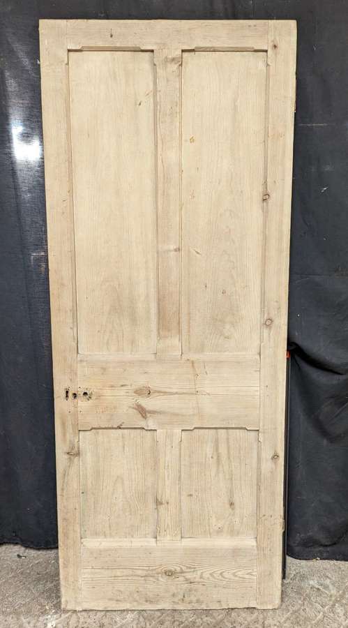 DI0930 A RECLAIMED 4 PANEL STRIPPED PINE INTERNAL DOOR