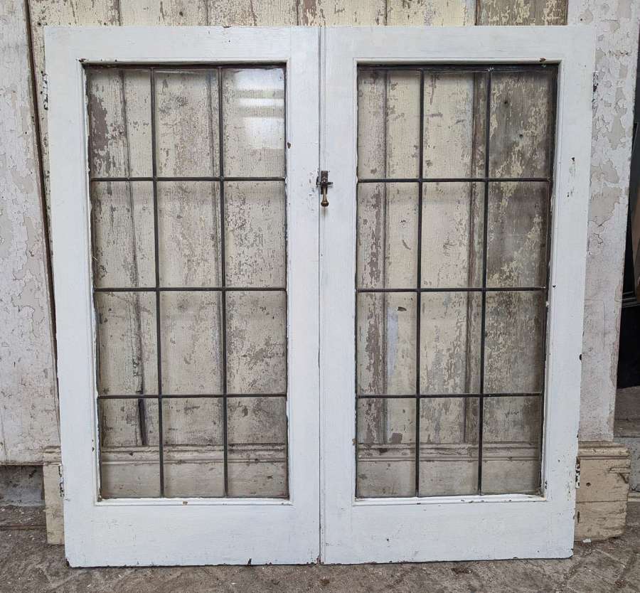 CS0161 A PAIR OF RECLAIMED LEADED GLASS CUPBOARD DOORS
